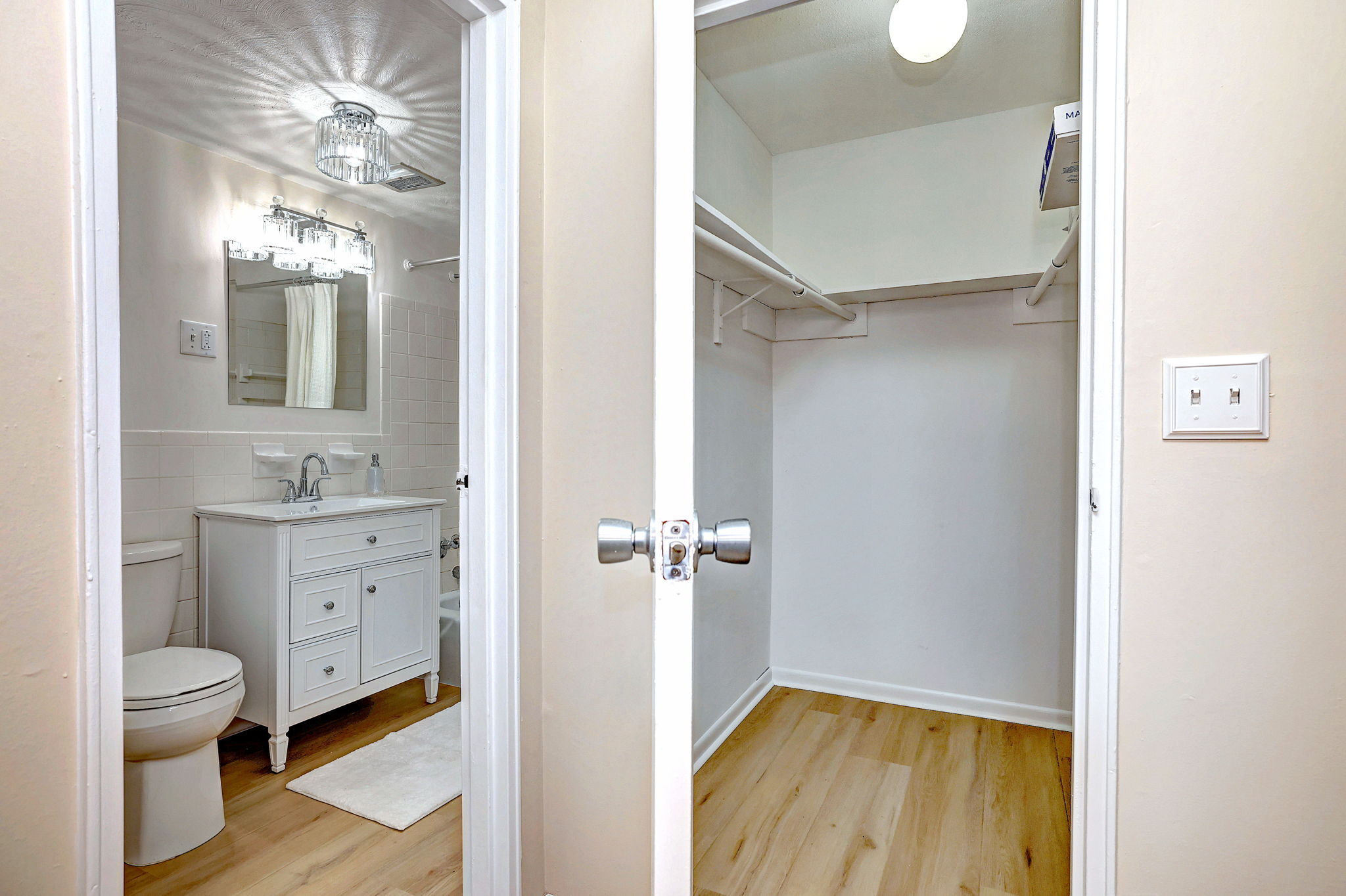 308 Meadowside Road, Unit 202 Milford, CT 06460 - Photo 35 of 40 a bathroom with a granite countertop sink toilet a mirror and shower