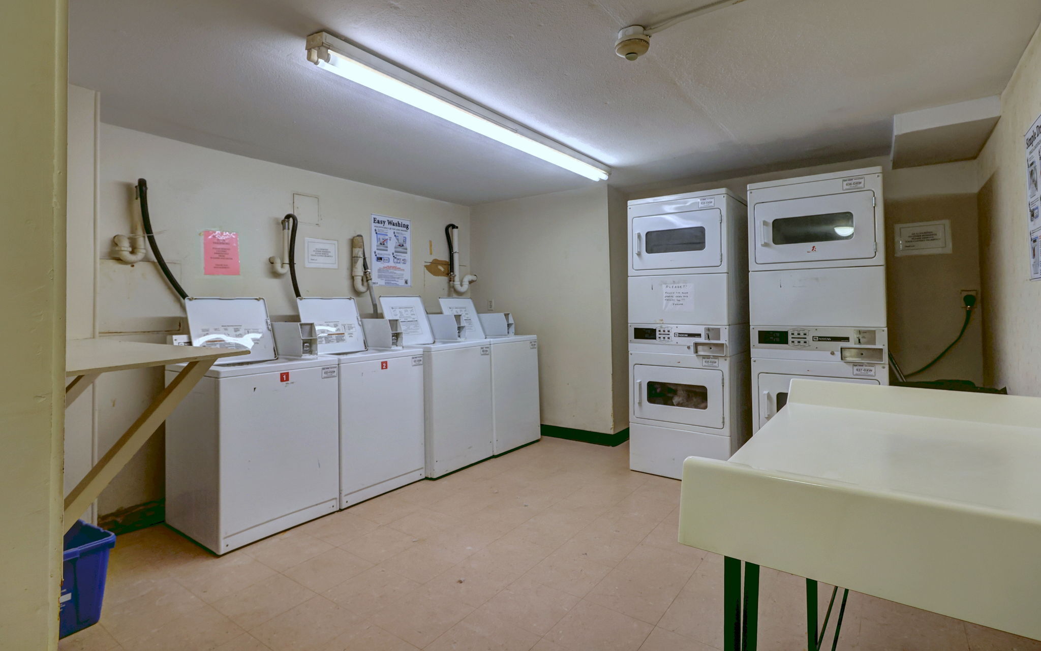 308 Meadowside Road, Unit 202 Milford, CT 06460 - Photo 40 of 40 a view of a kitchen with fridge and workspace