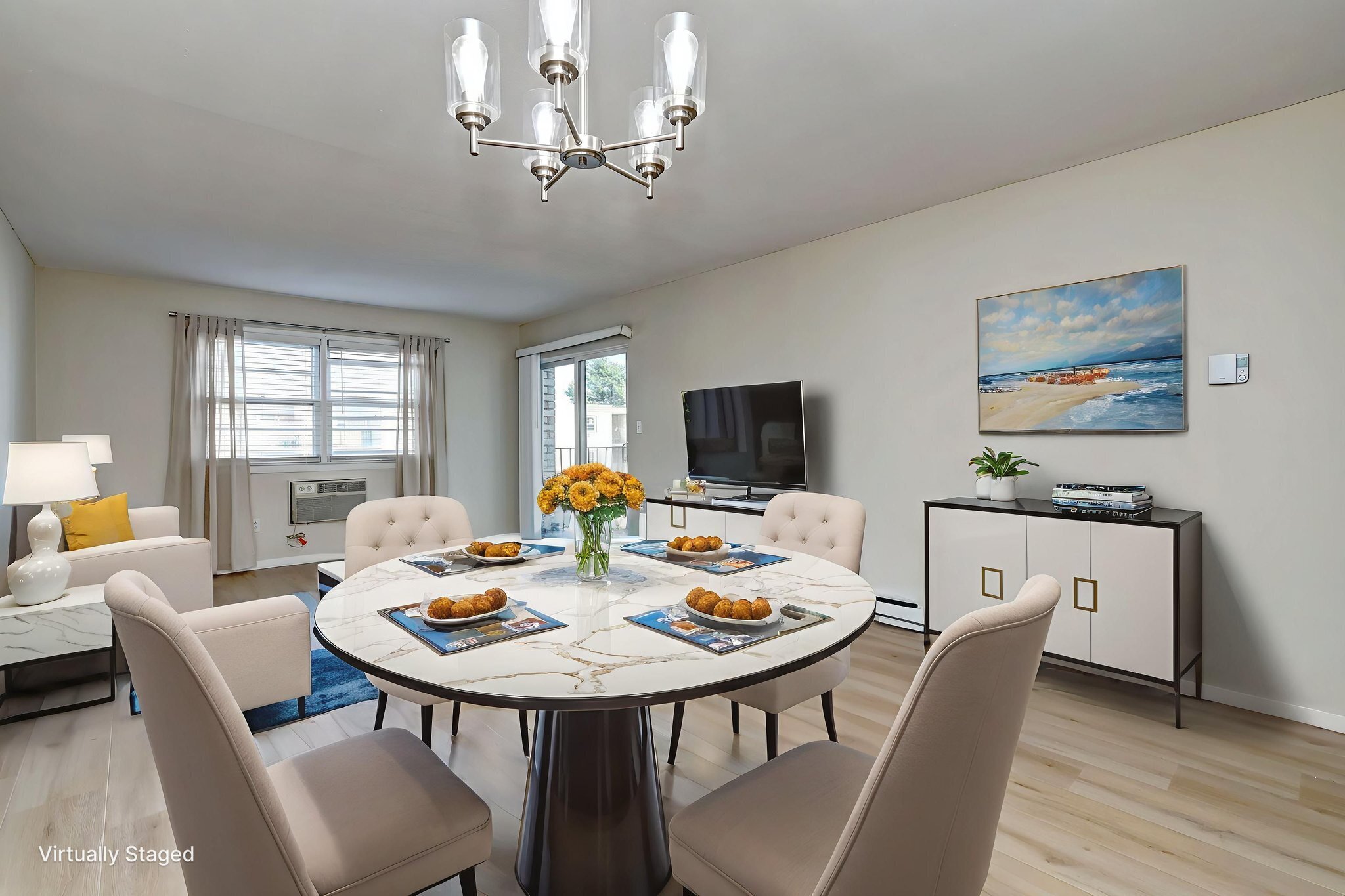 308 Meadowside Road, Unit 202 Milford, CT 06460 - Photo 8 of 40 a view of a dining room with furniture window and wooden floor