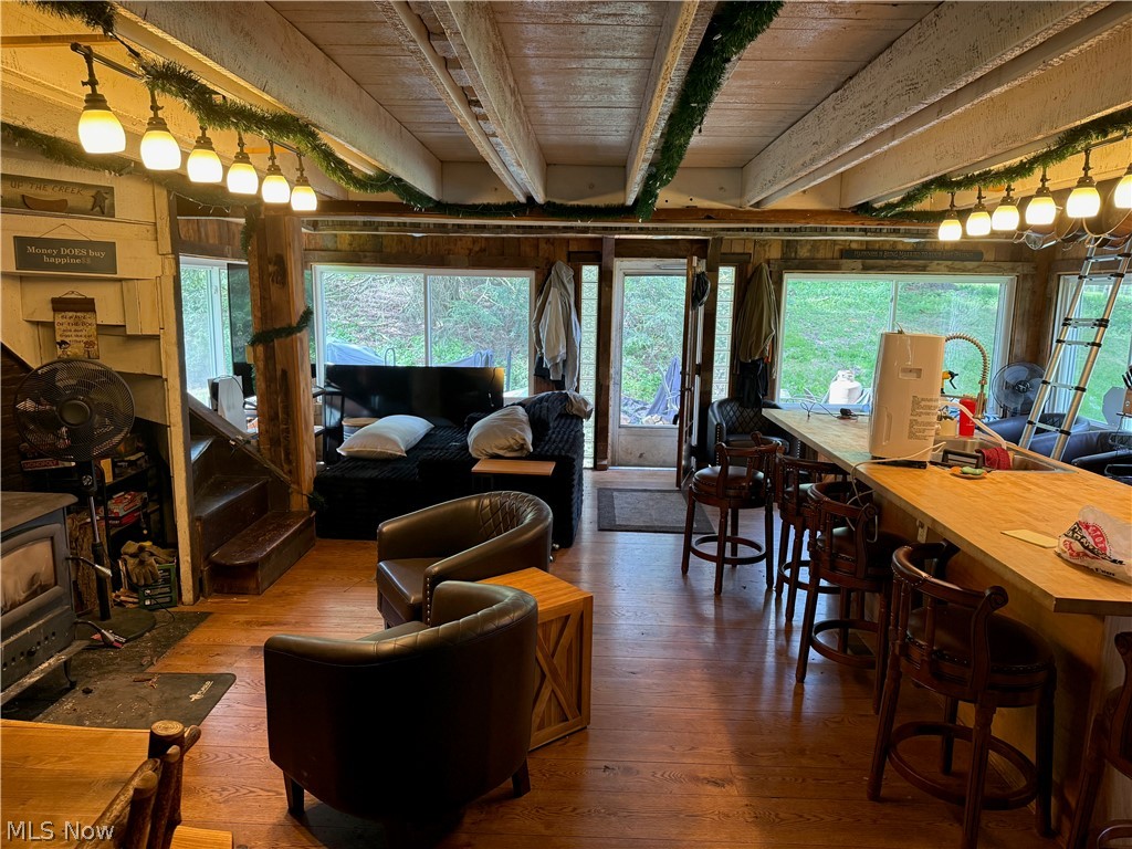 11811 Gaston Road Rogers, OH 44455 - Photo 27 of 38 Enjoy your time inside this cozy, functional, and equipped log cabin! You've already got the important utilities like electric, geo-thermal heat, a septic system installed 6 years ago, and private well water.