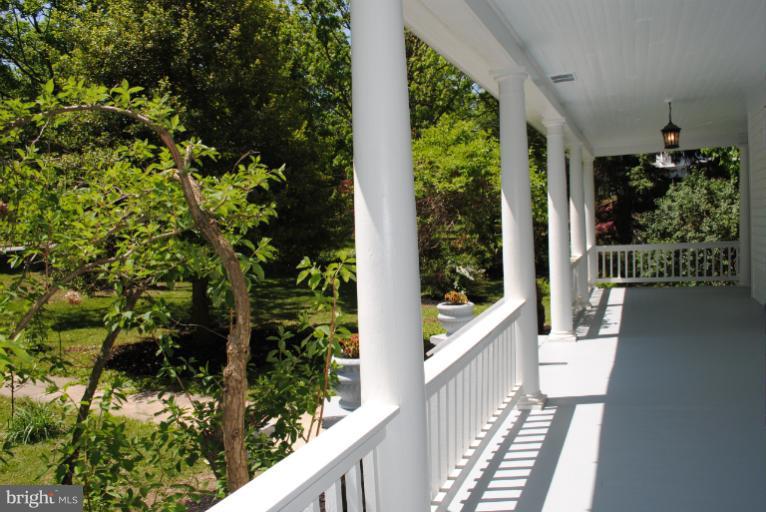 2418 Ken Oak Road Baltimore, MD 21209 - Photo 14 of 18 wrap around front porch