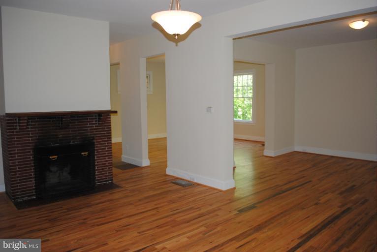 2418 Ken Oak Road Baltimore, MD 21209 - Photo 4 of 18 entrance foyer, living room and dining room