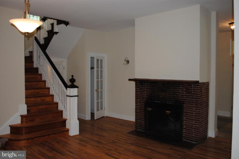 2418 Ken Oak Road Baltimore, MD 21209 - Photo 9 of 18 Entrance foyer with fireplace