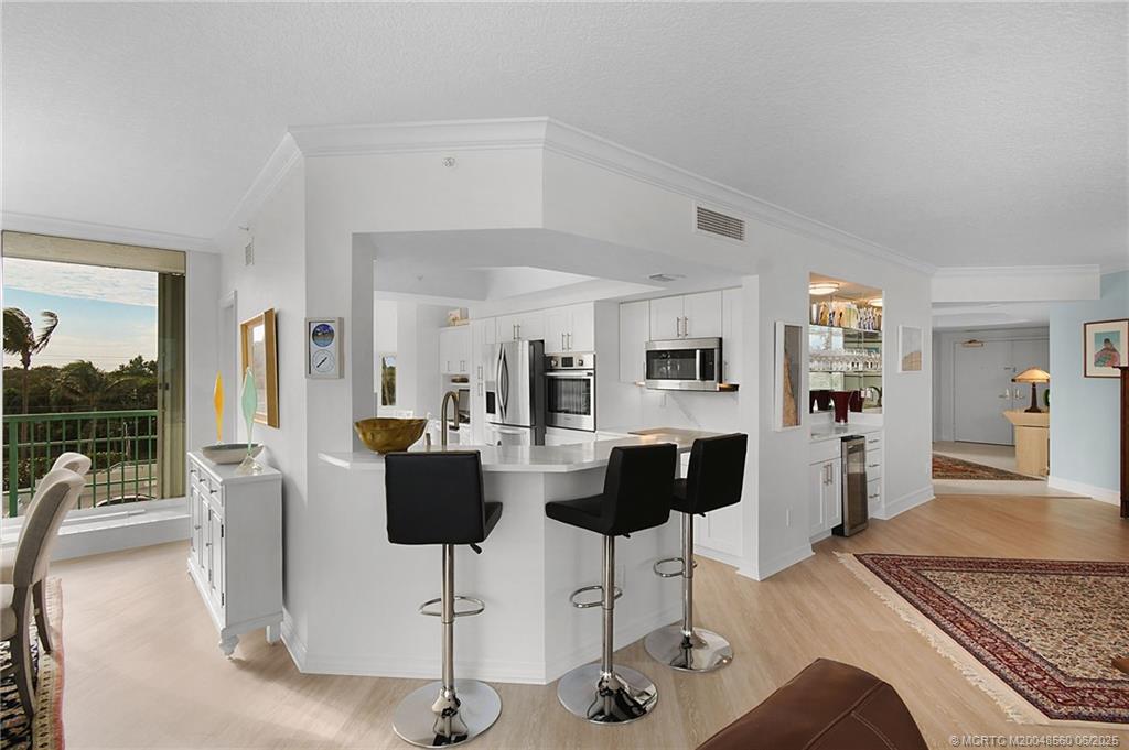 8600 South Ocean Drive, Unit 306 Jensen Beach, FL 34957 - Photo 12 of 76 a view of a livingroom with furniture