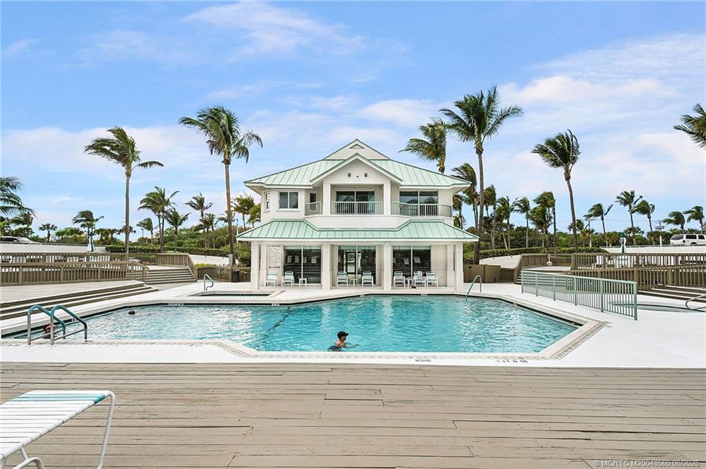8600 South Ocean Drive, Unit 306 Jensen Beach, FL 34957 - Photo 67 of 76 a view of a house with a swimming pool