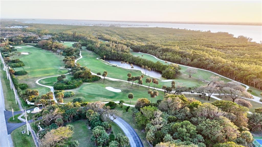 8600 South Ocean Drive, Unit 306 Jensen Beach, FL 34957 - Photo 70 of 76 an aerial view of residential houses with outdoor space and river