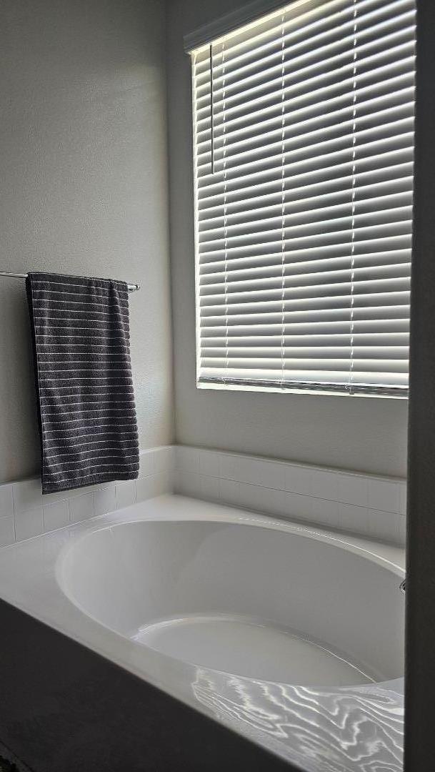 2865 Bering Street Manteca, CA 95337 - Photo 9 of 11 a bathroom with a window and a window