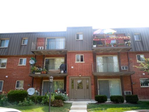 a front view of a brick building