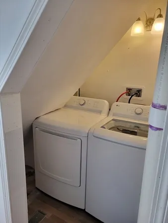 a utility room with dryer and washer