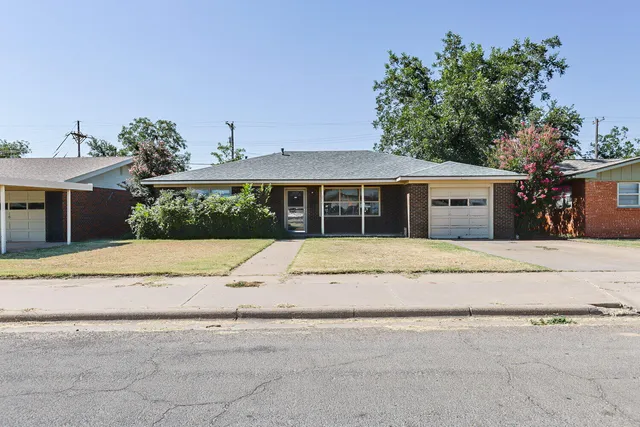 front view of house with a yard