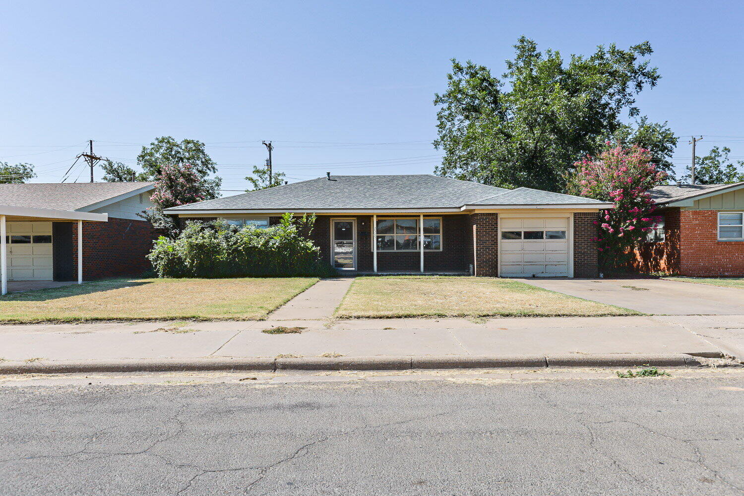 front view of house with a yard
