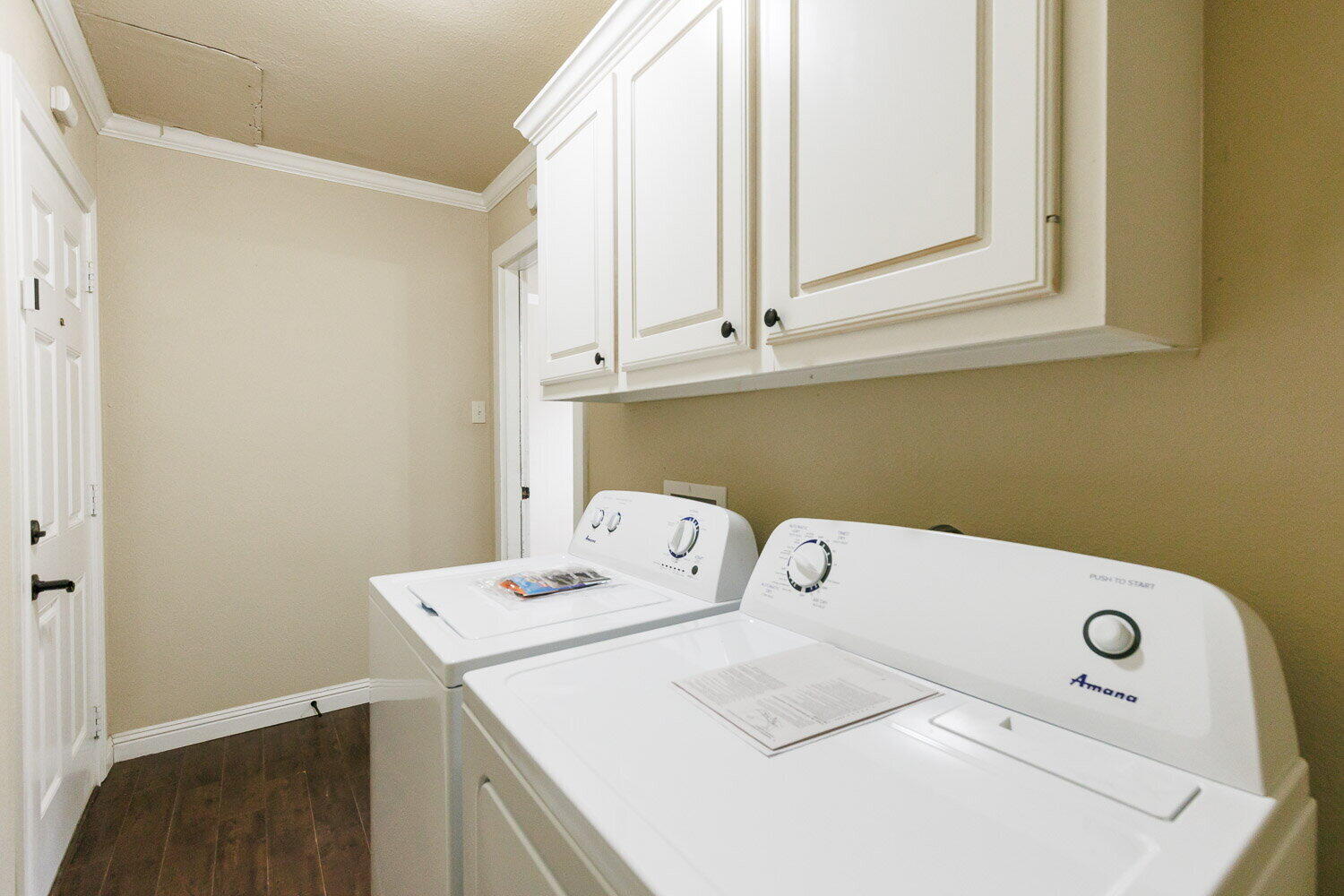 2505 52nd Street Lubbock, TX 79413 - Photo 20 of 37 a utility room with dryer and washer