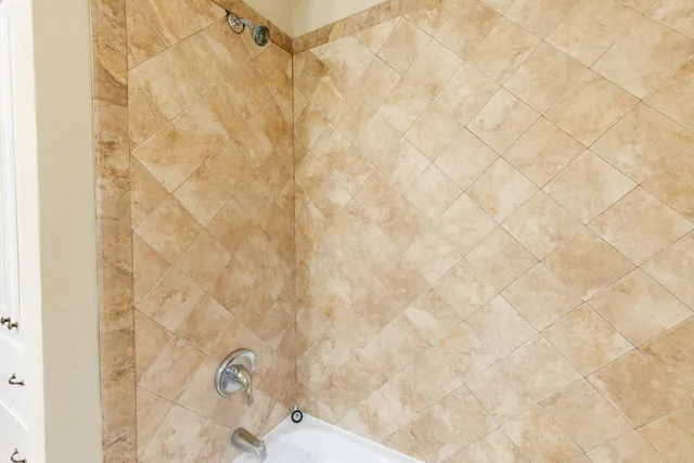 a bathroom with a shower curtain