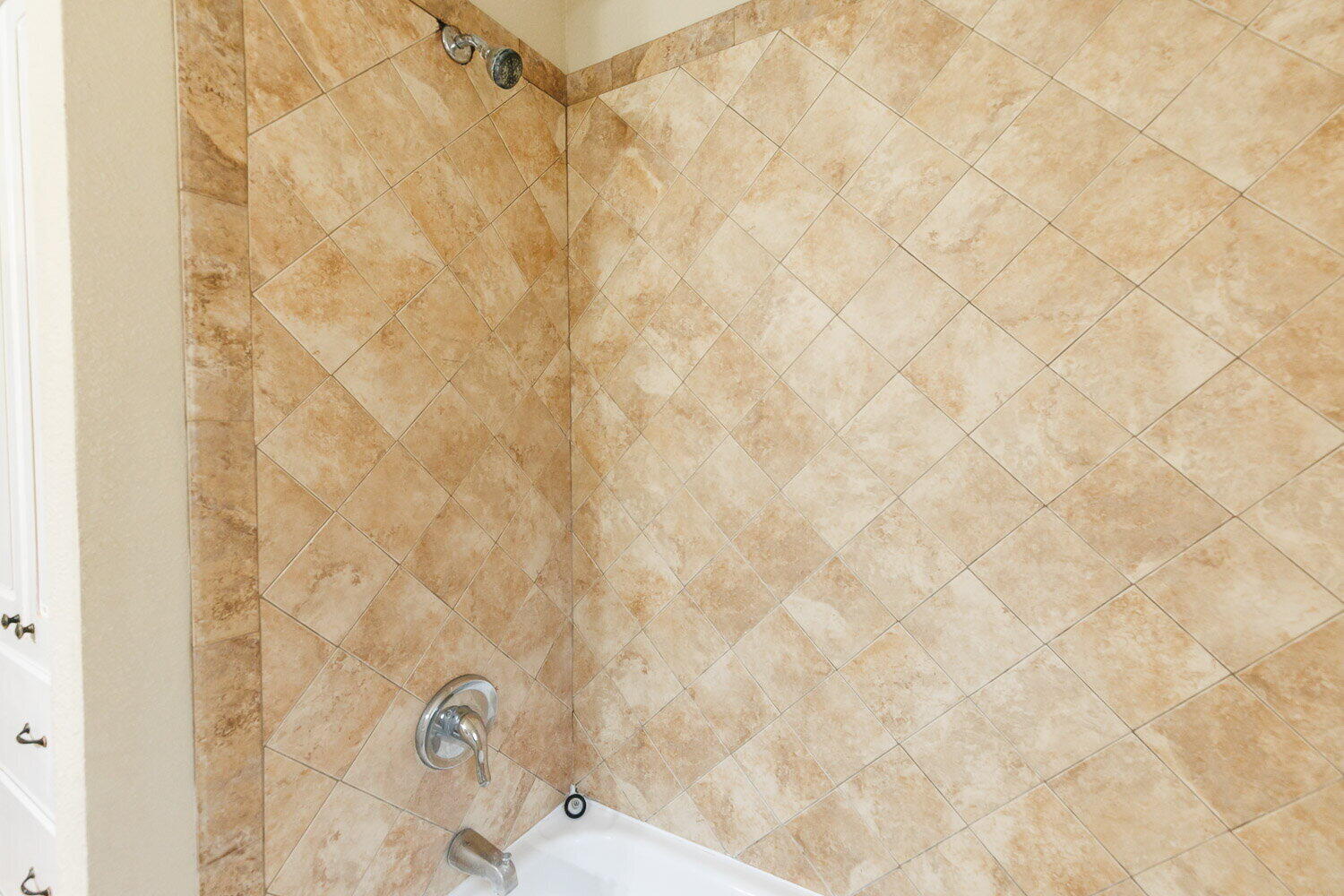2505 52nd Street Lubbock, TX 79413 - Photo 31 of 37 a bathroom with a shower curtain
