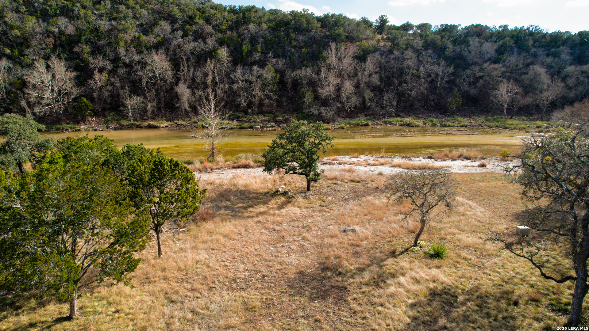 196 B Rock Bottom Road Hunt, TX 78024 - Photo 47 of 54 a view of a swimming pool with a yard