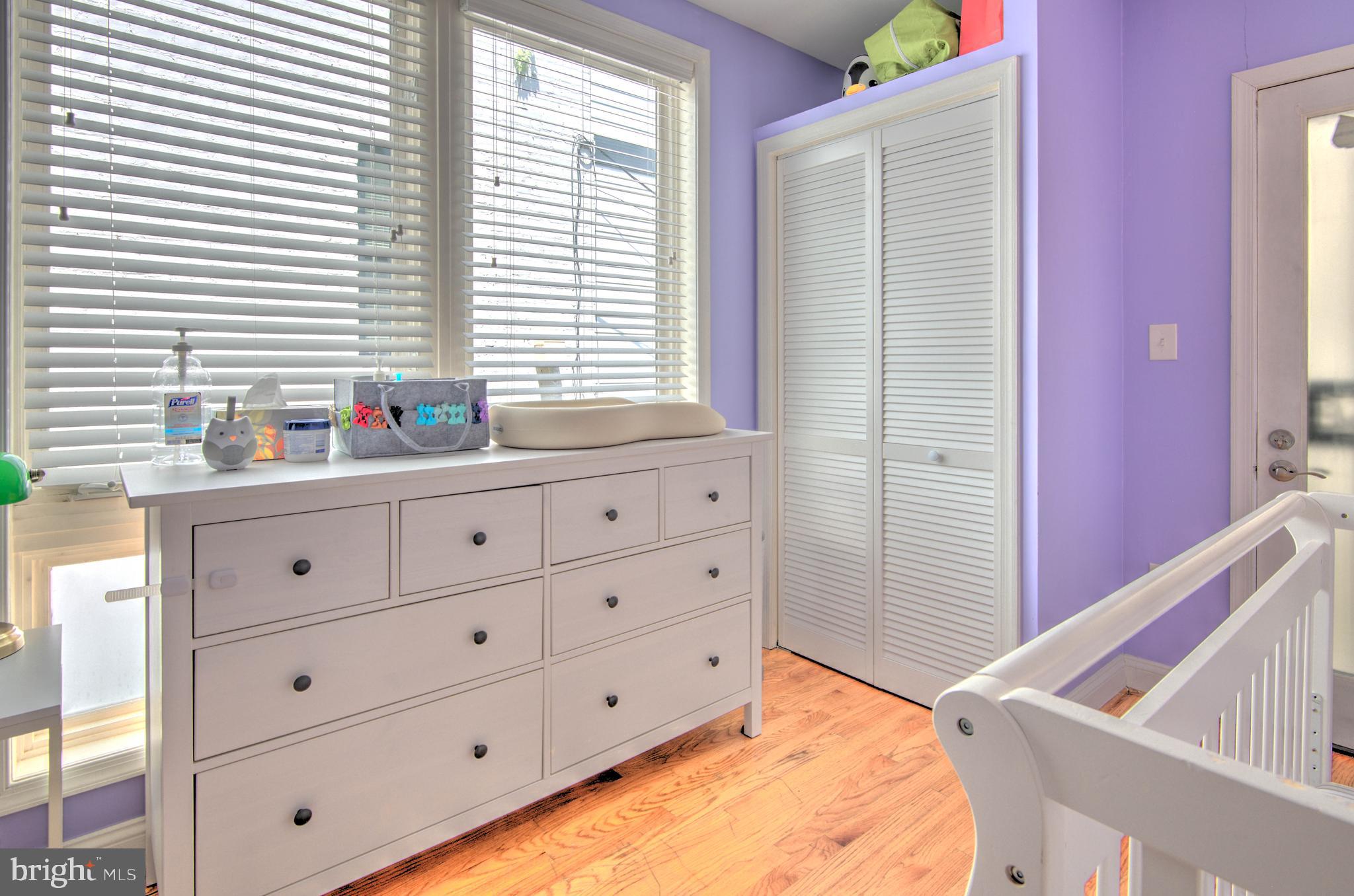 1302 Childress Street Northeast, Unit 4 Washington, DC 20002 - Photo 17 of 17 a kitchen with cabinets appliances and a window