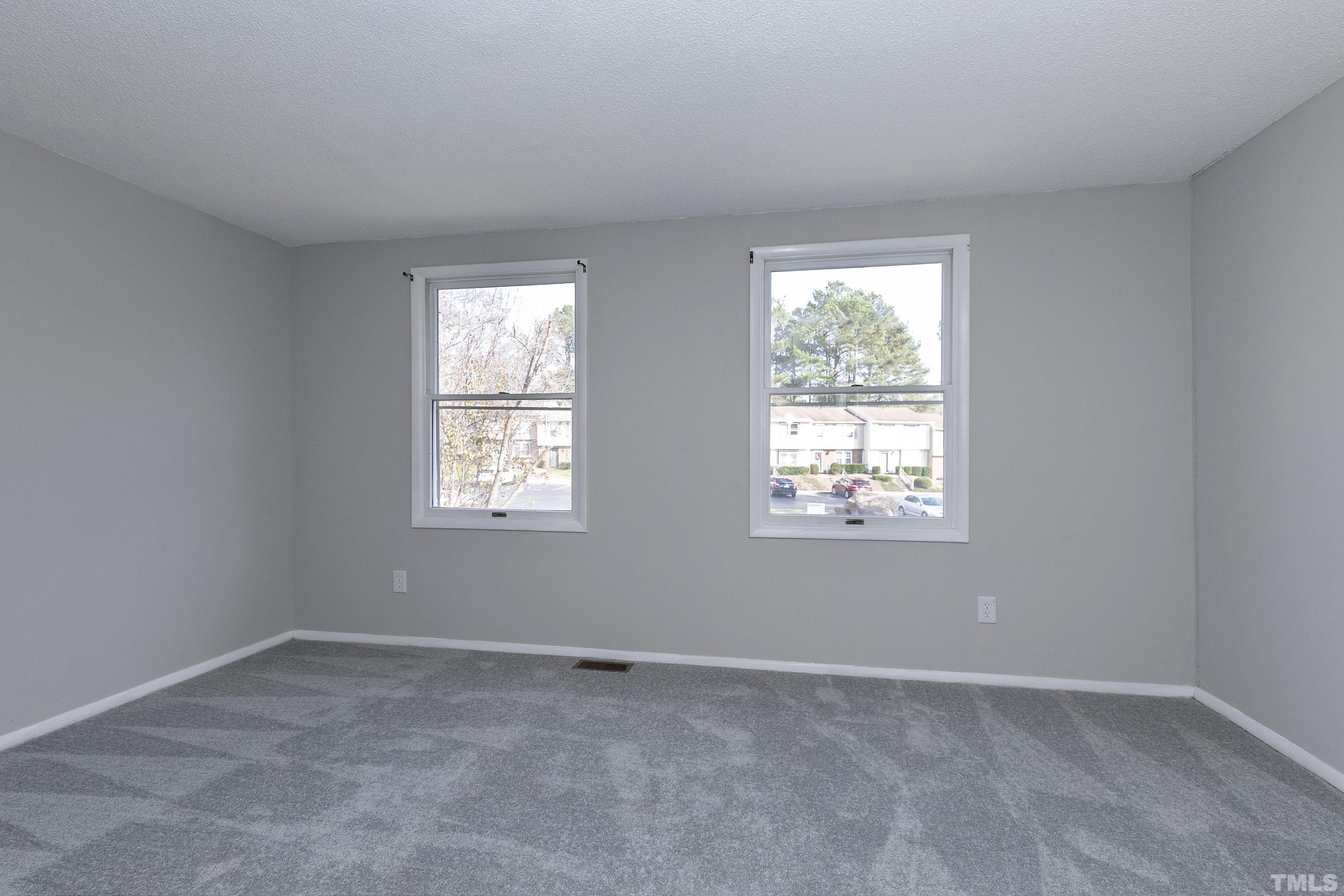7735 Kelley Court Raleigh, NC 27615 - Photo 14 of 26 an empty room with a window