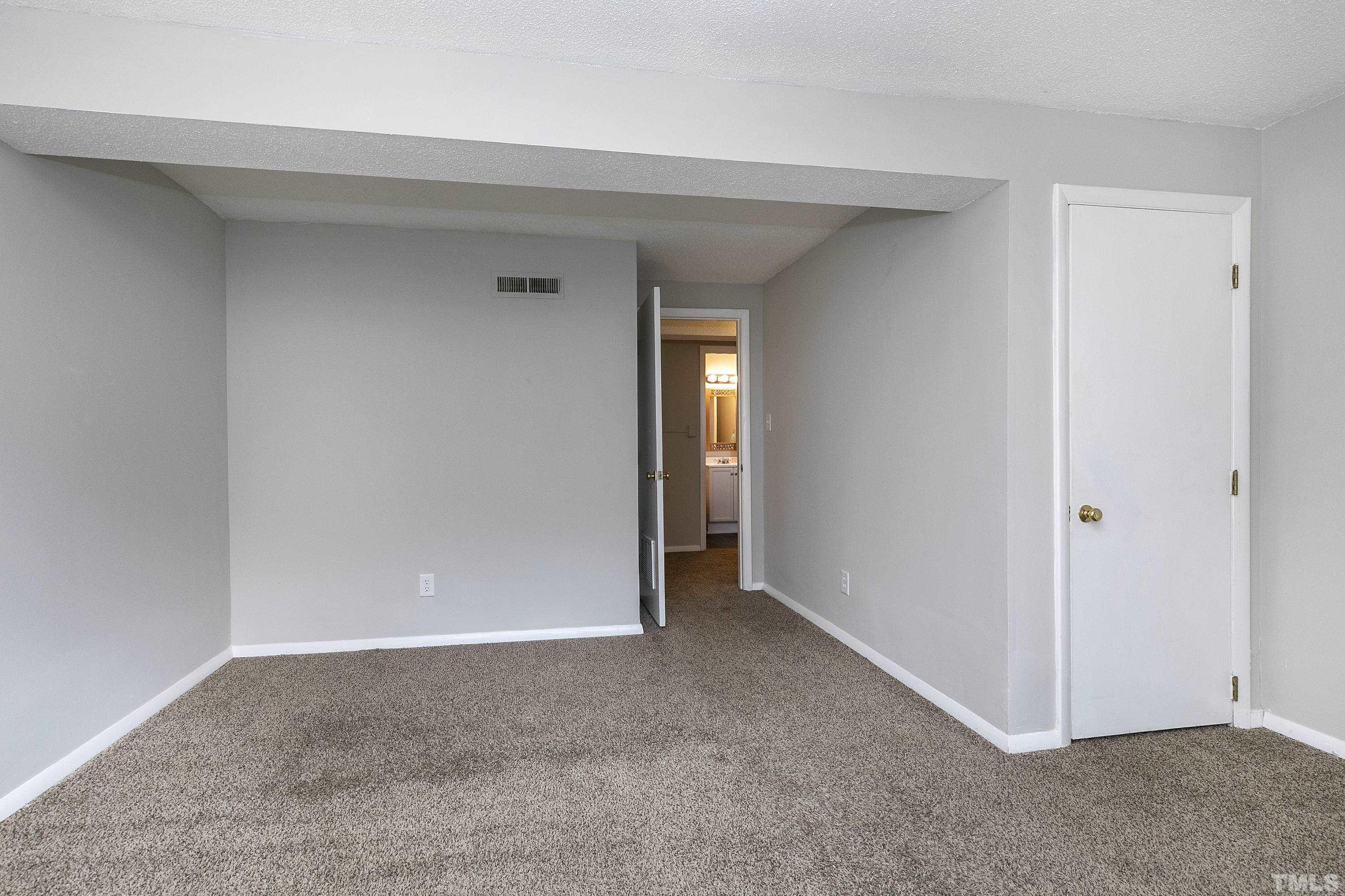 7735 Kelley Court Raleigh, NC 27615 - Photo 20 of 26 a view of an empty room