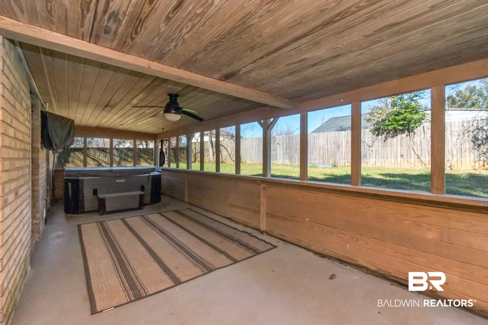 9410 Ashwood Court Mobile, AL 36695 - Photo 19 of 20 Unfurnished sunroom with a ceiling fan