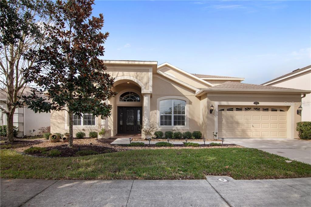 10824 Breaking Rocks Drive Tampa, FL 33647 - Photo 1 of 1 a front view of house with yard