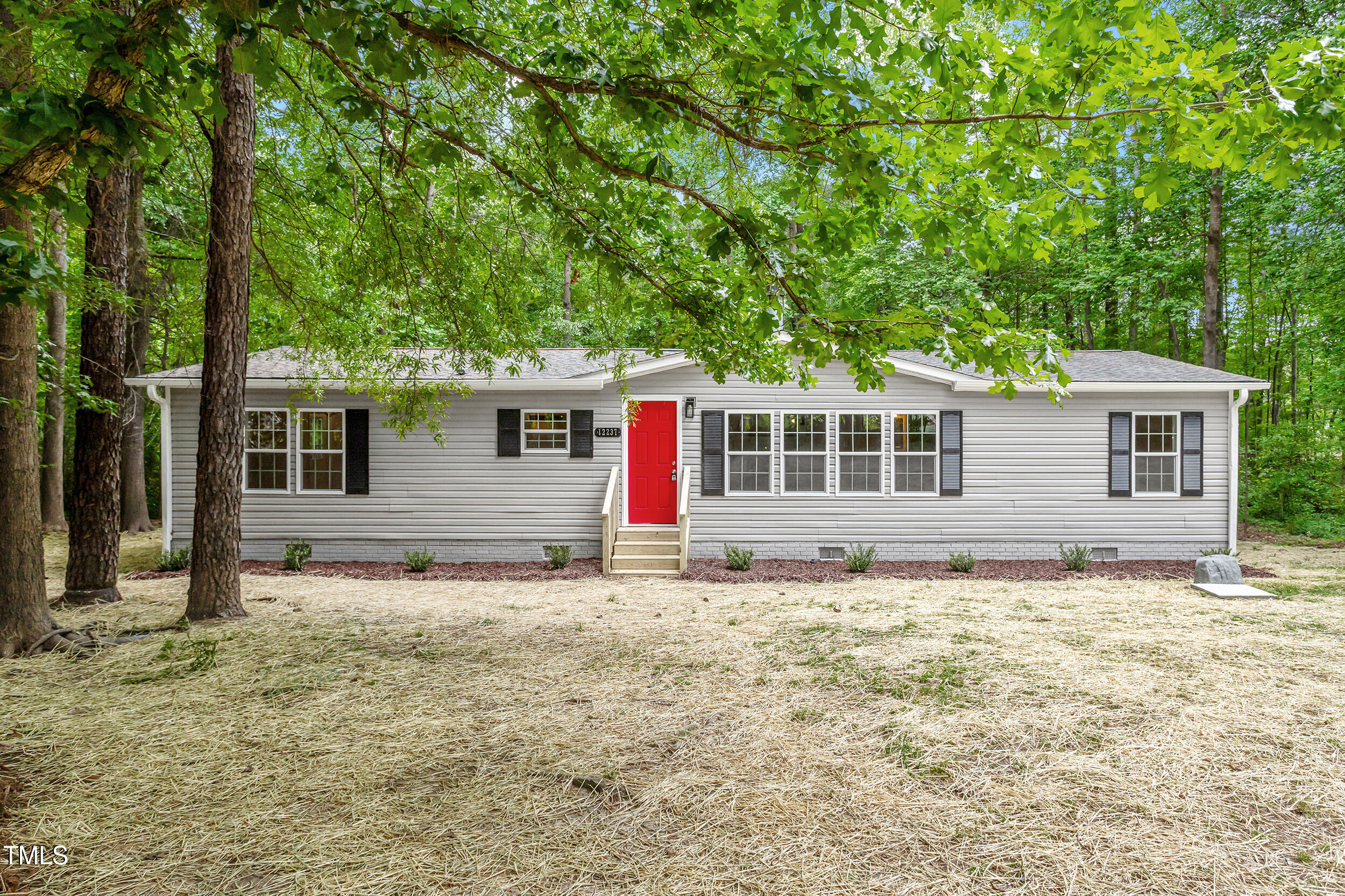 12237 Burgess Road Middlesex, NC 27557 - Photo 1 of 35 front view of a house with a yard