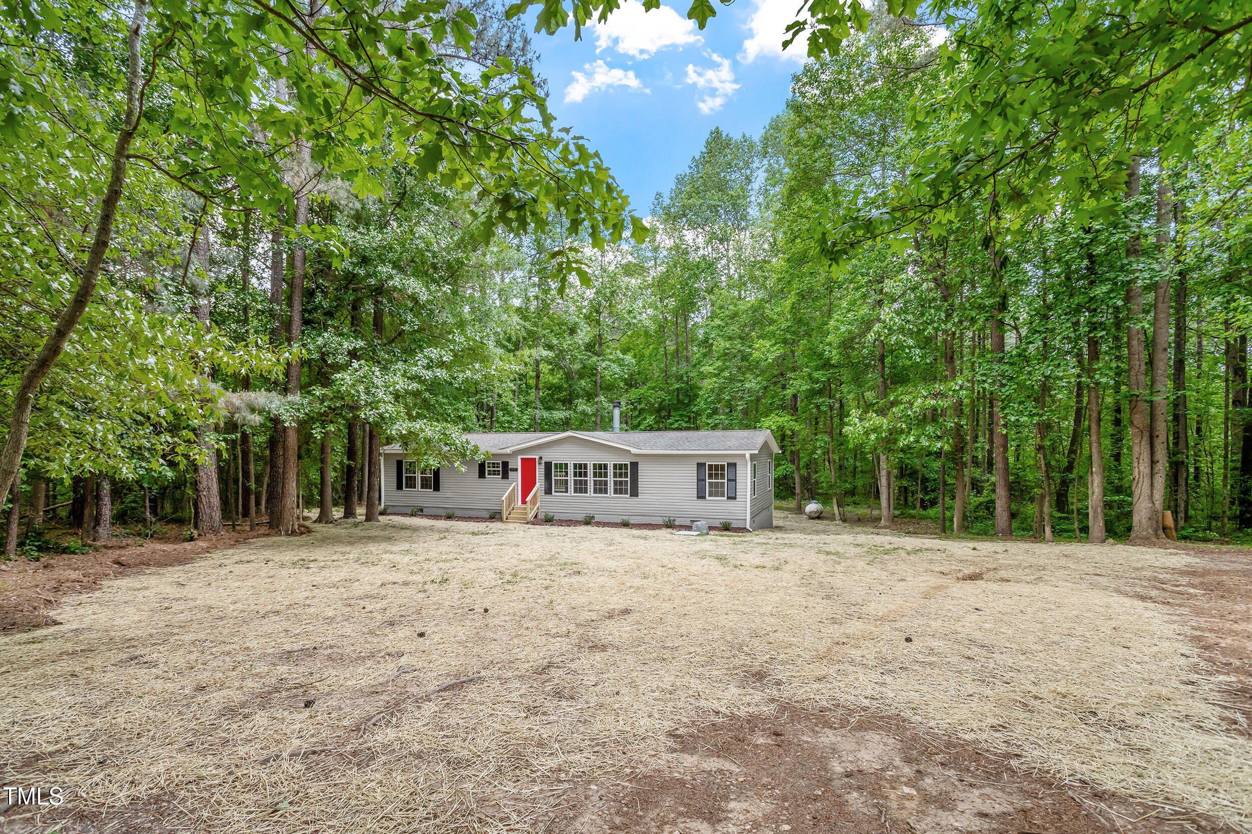 12237 Burgess Road Middlesex, NC 27557 - Photo 25 of 35 a house view with a outdoor space