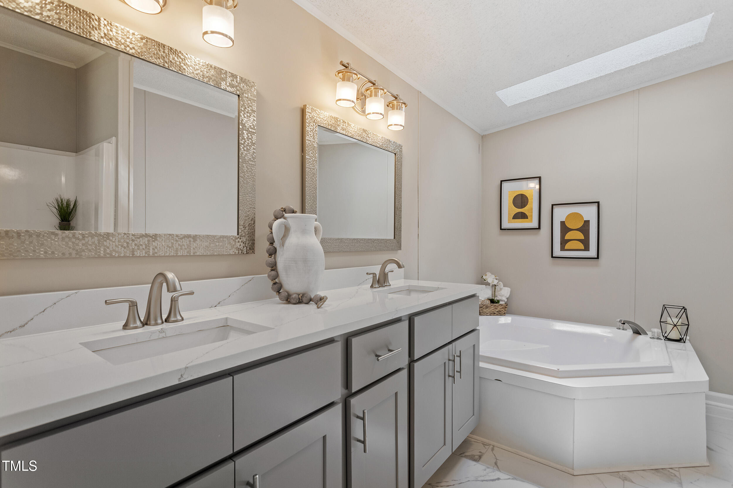 12237 Burgess Road Middlesex, NC 27557 - Photo 8 of 35 a bathroom with a granite countertop sink and a mirror