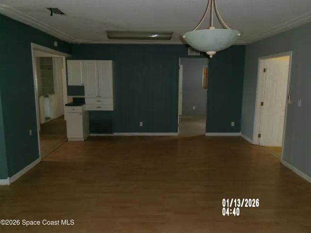 a view of a kitchen with a sink
