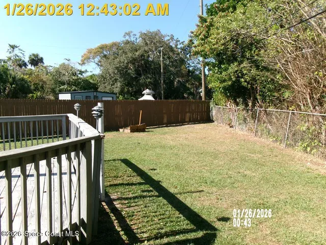 a view of a kitchen with a sink and a stove