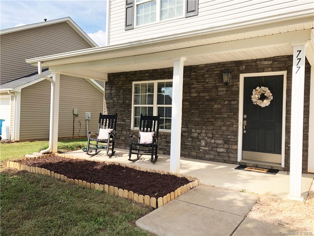 777 Jones Branch Road Fort Mill, SC 29715 - Photo 1 of 27 a front view of a house with outdoor seating