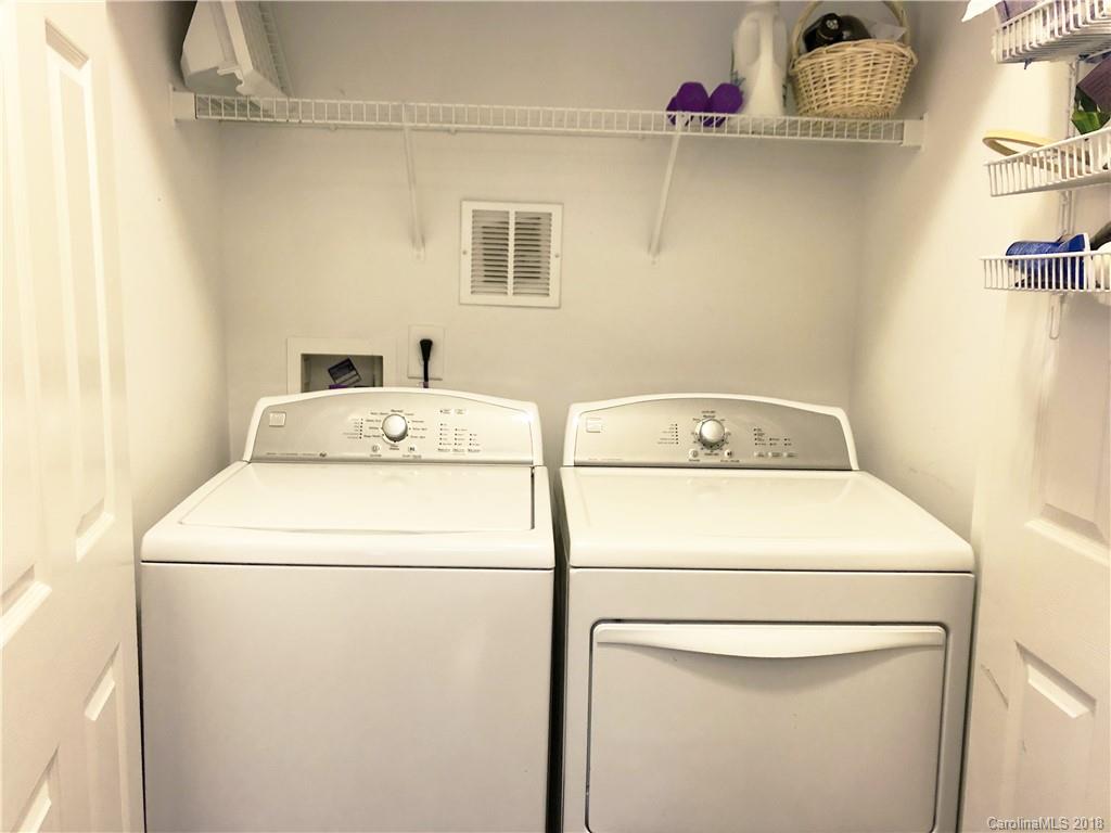 777 Jones Branch Road Fort Mill, SC 29715 - Photo 11 of 27 a utility room with dryer and washer