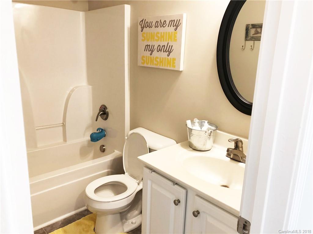 777 Jones Branch Road Fort Mill, SC 29715 - Photo 19 of 27 a bathroom with a sink and a mirror
