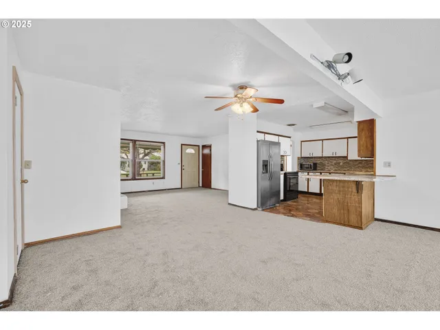 a view of kitchen and windows