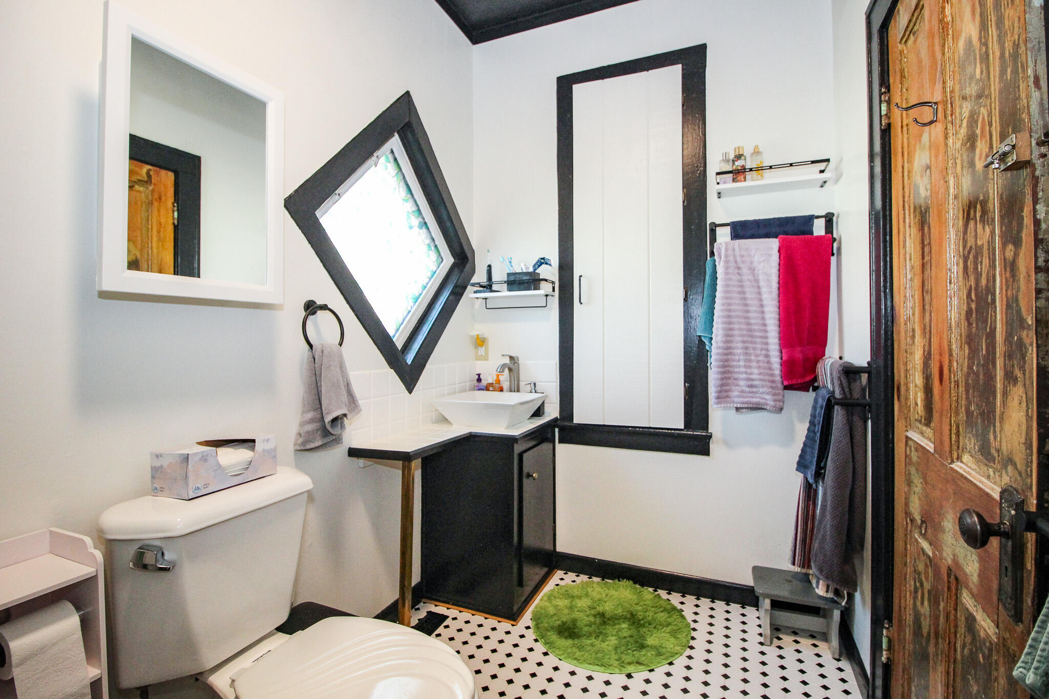 1765 Tower Street Chesterton, IN 46304 - Photo 12 of 27 a bathroom with a toilet sink and mirror