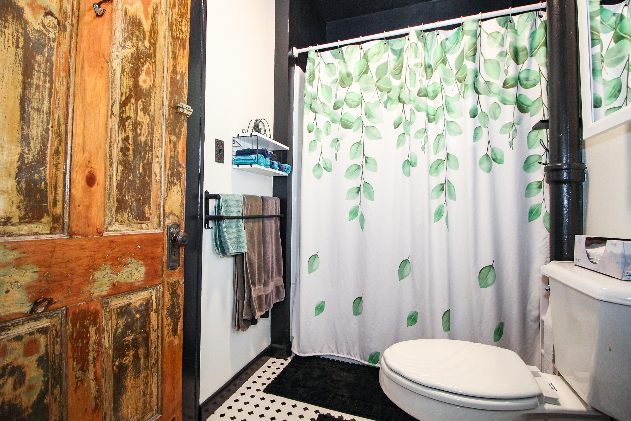 1765 Tower Street Chesterton, IN 46304 - Photo 13 of 27 a bathroom with a toilet and shower curtain