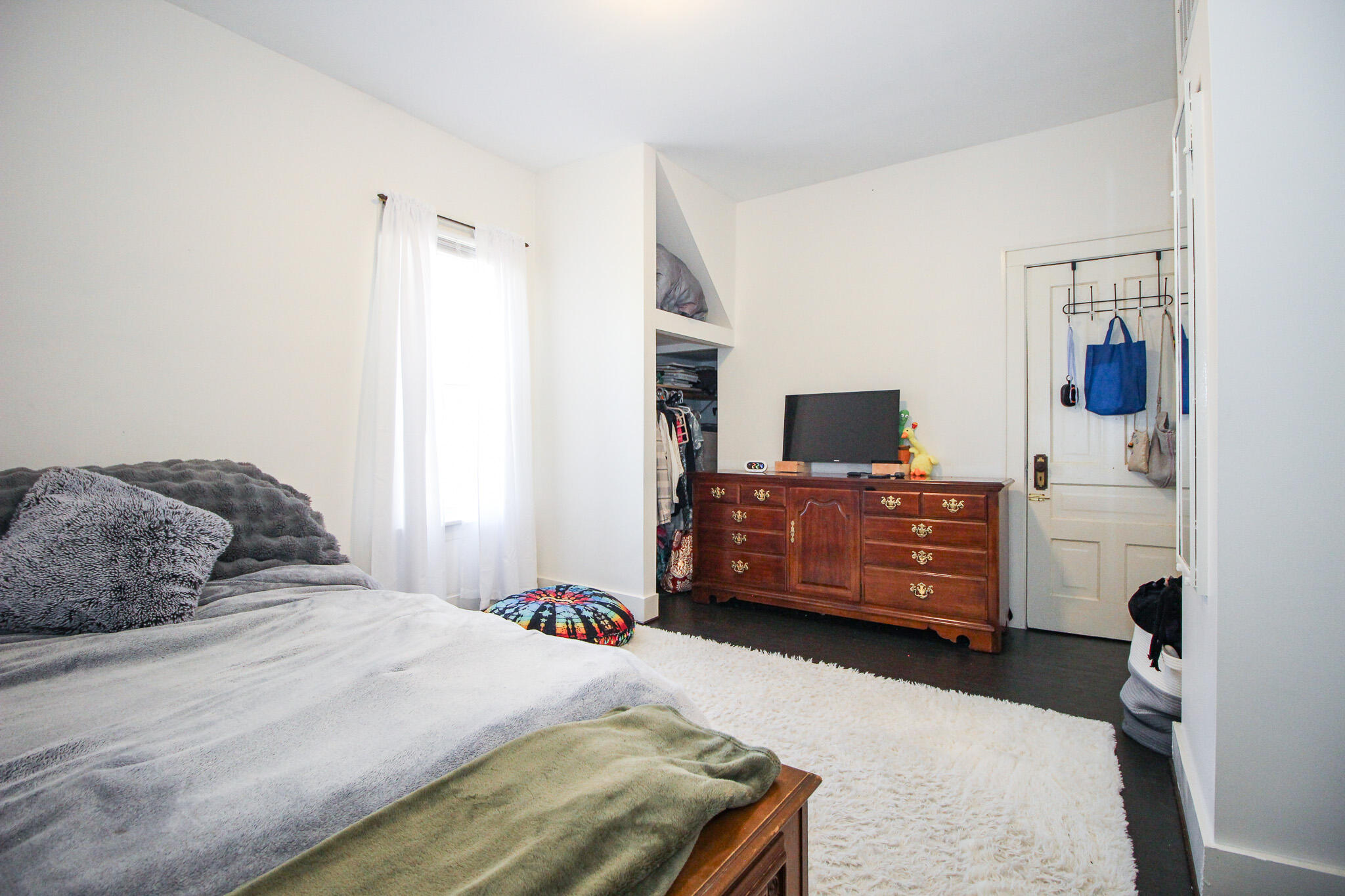 1765 Tower Street Chesterton, IN 46304 - Photo 16 of 27 a bedroom with a bed flat screen tv and dresser