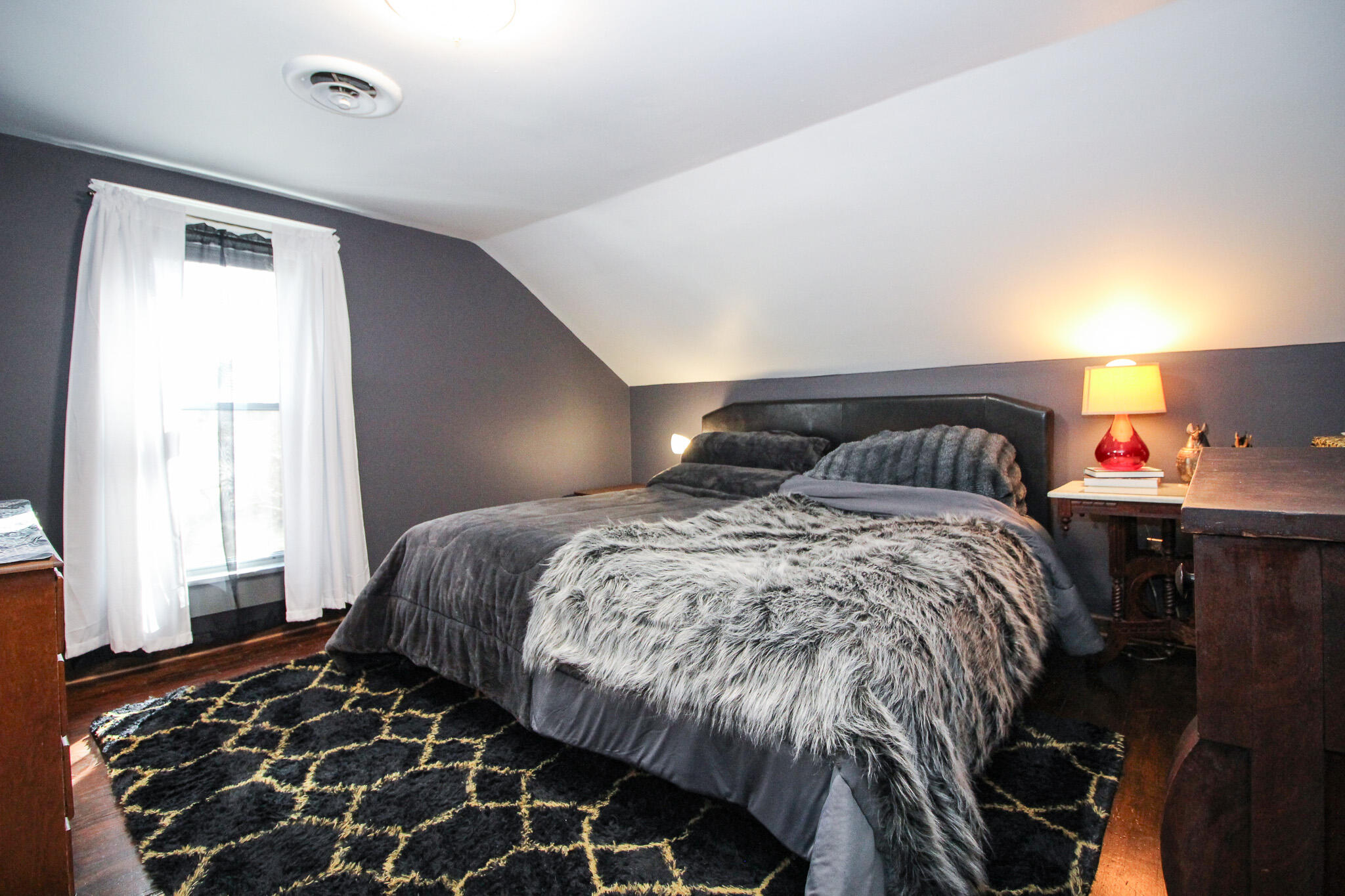1765 Tower Street Chesterton, IN 46304 - Photo 20 of 27 a bedroom with a bed and wooden floor
