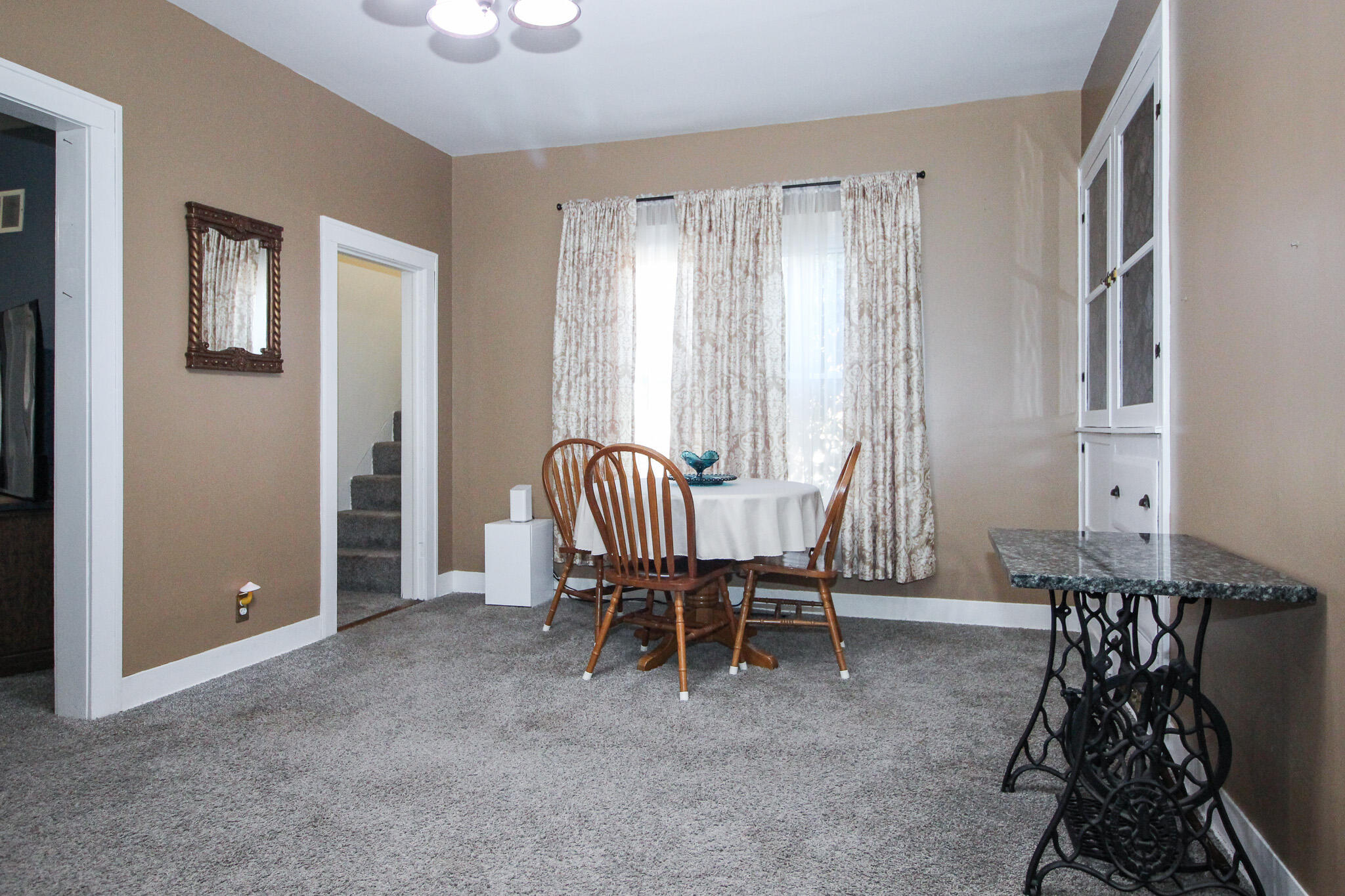 1765 Tower Street Chesterton, IN 46304 - Photo 4 of 27 a dining room with furniture and window