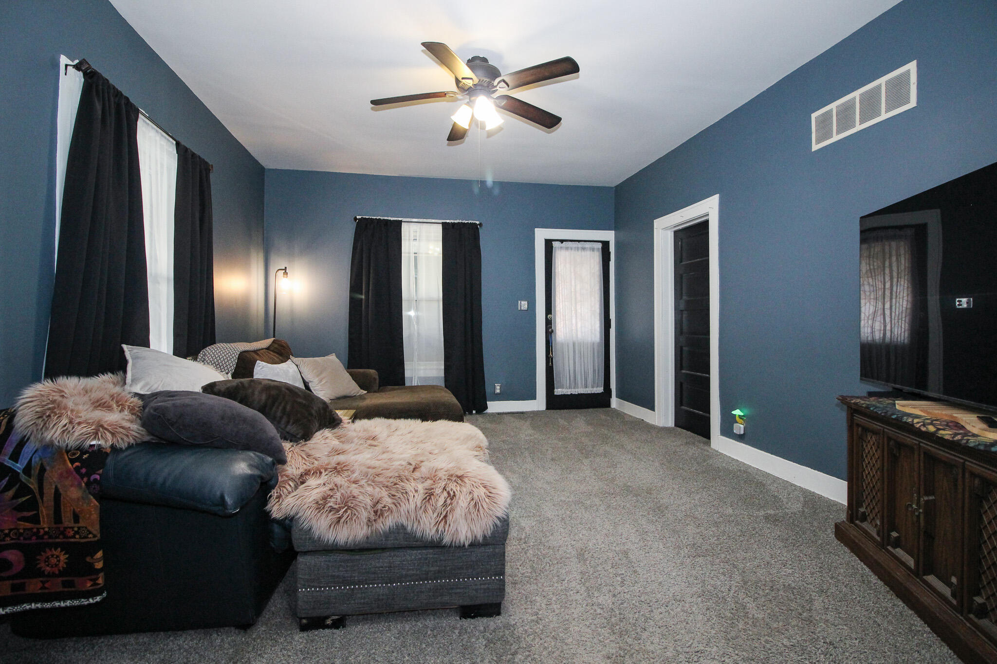 1765 Tower Street Chesterton, IN 46304 - Photo 6 of 27 a bedroom with furniture and a flat tv screen