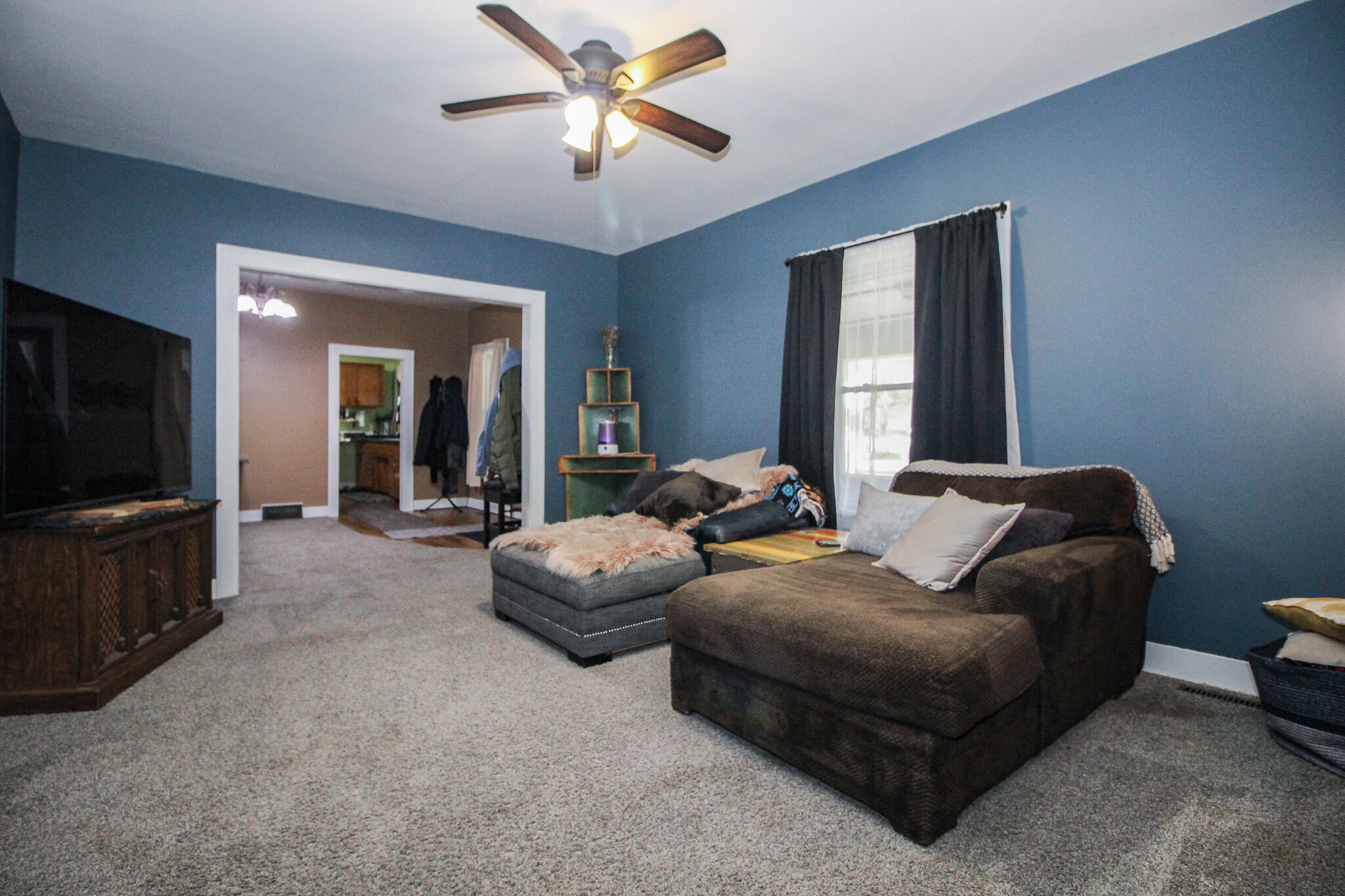 1765 Tower Street Chesterton, IN 46304 - Photo 8 of 27 a living room with furniture and a flat screen tv