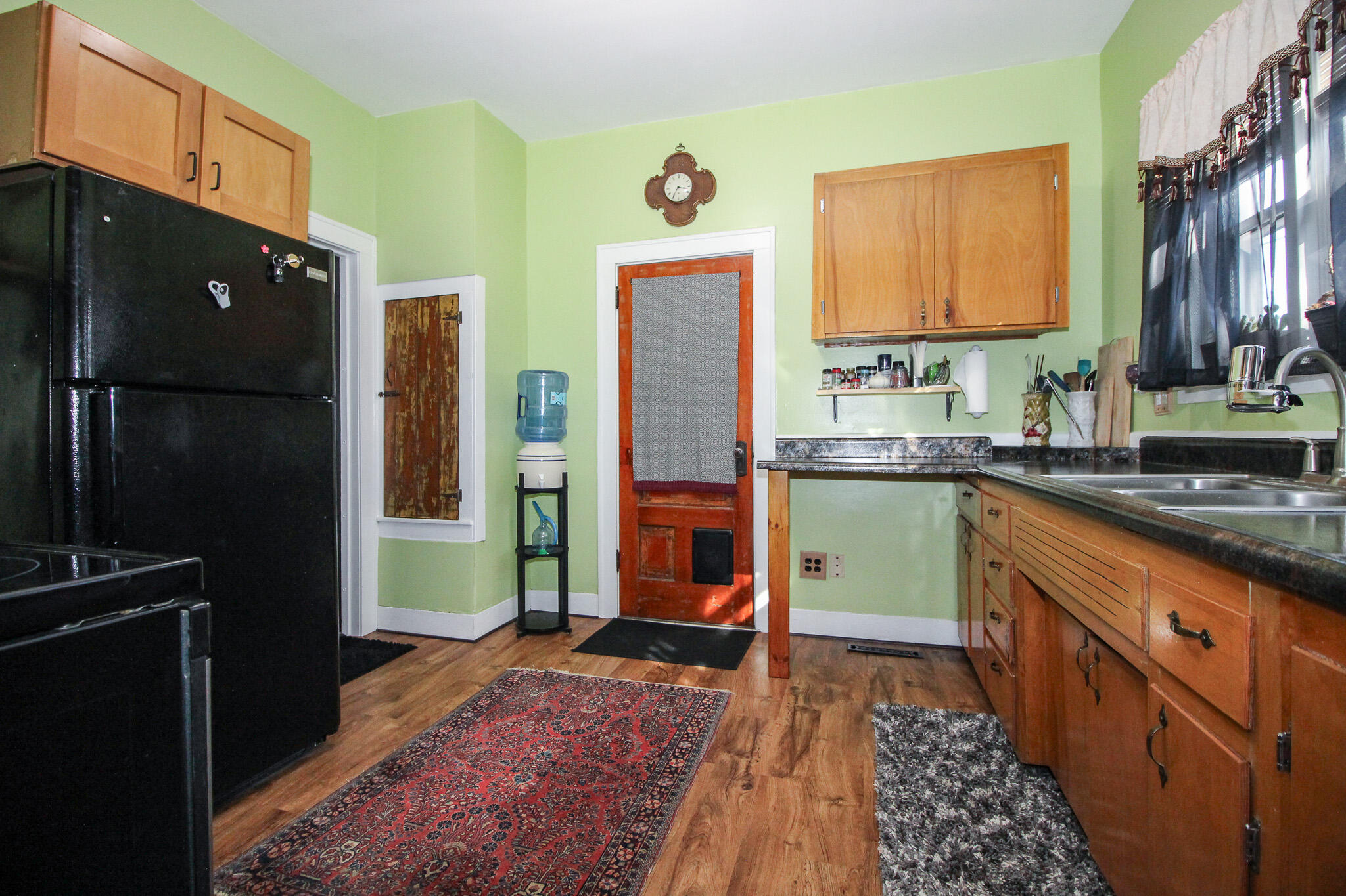 1765 Tower Street Chesterton, IN 46304 - Photo 9 of 27 a kitchen with stainless steel appliances granite countertop a refrigerator a stove and a sink