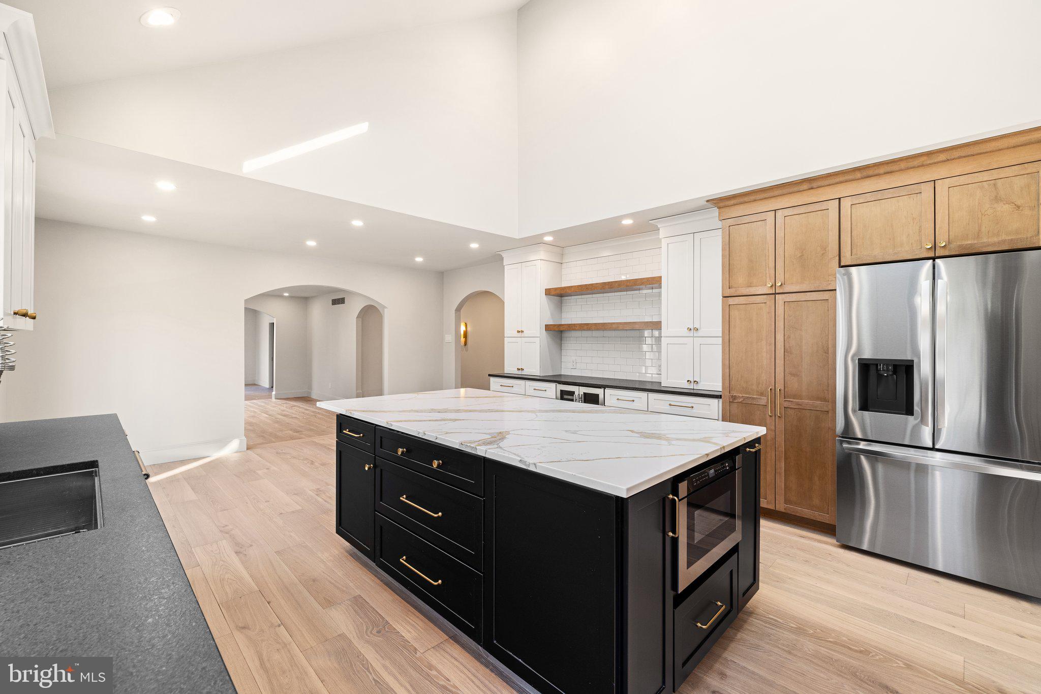 1555 Beechnut Circle Ambler, PA 19002 - Photo 27 of 58 a kitchen with a stove a refrigerator and a sink
