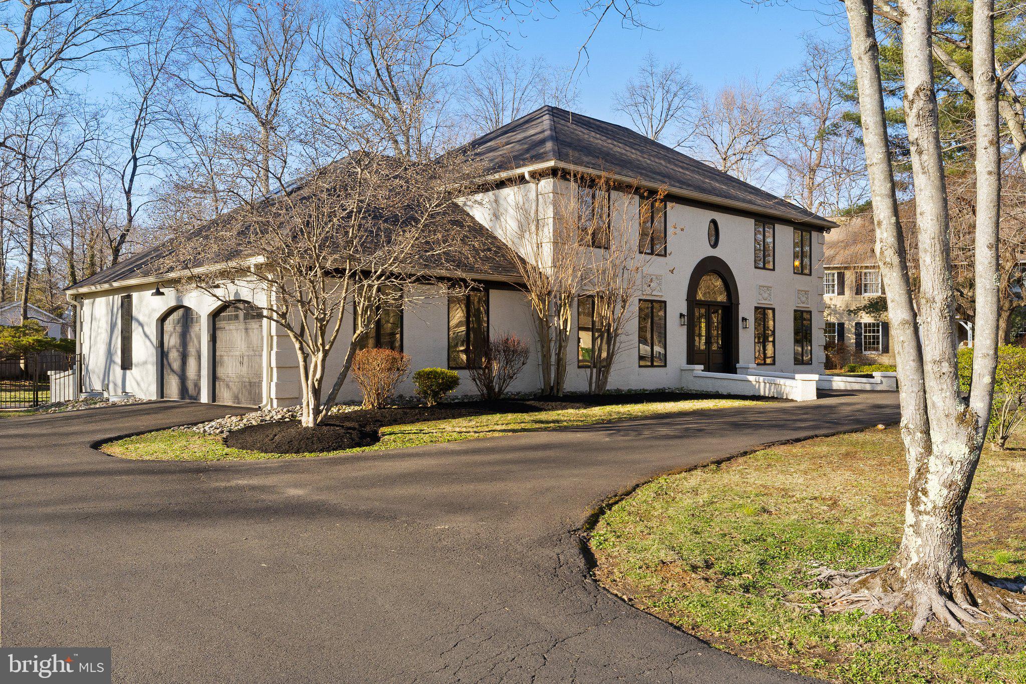 1555 Beechnut Circle Ambler, PA 19002 - Photo 3 of 58 a front view of a house with swimming pool