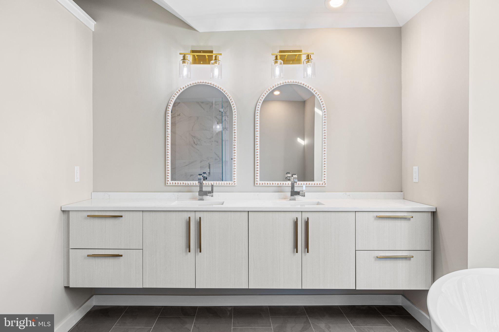 1555 Beechnut Circle Ambler, PA 19002 - Photo 38 of 58 a bathroom with mirror and