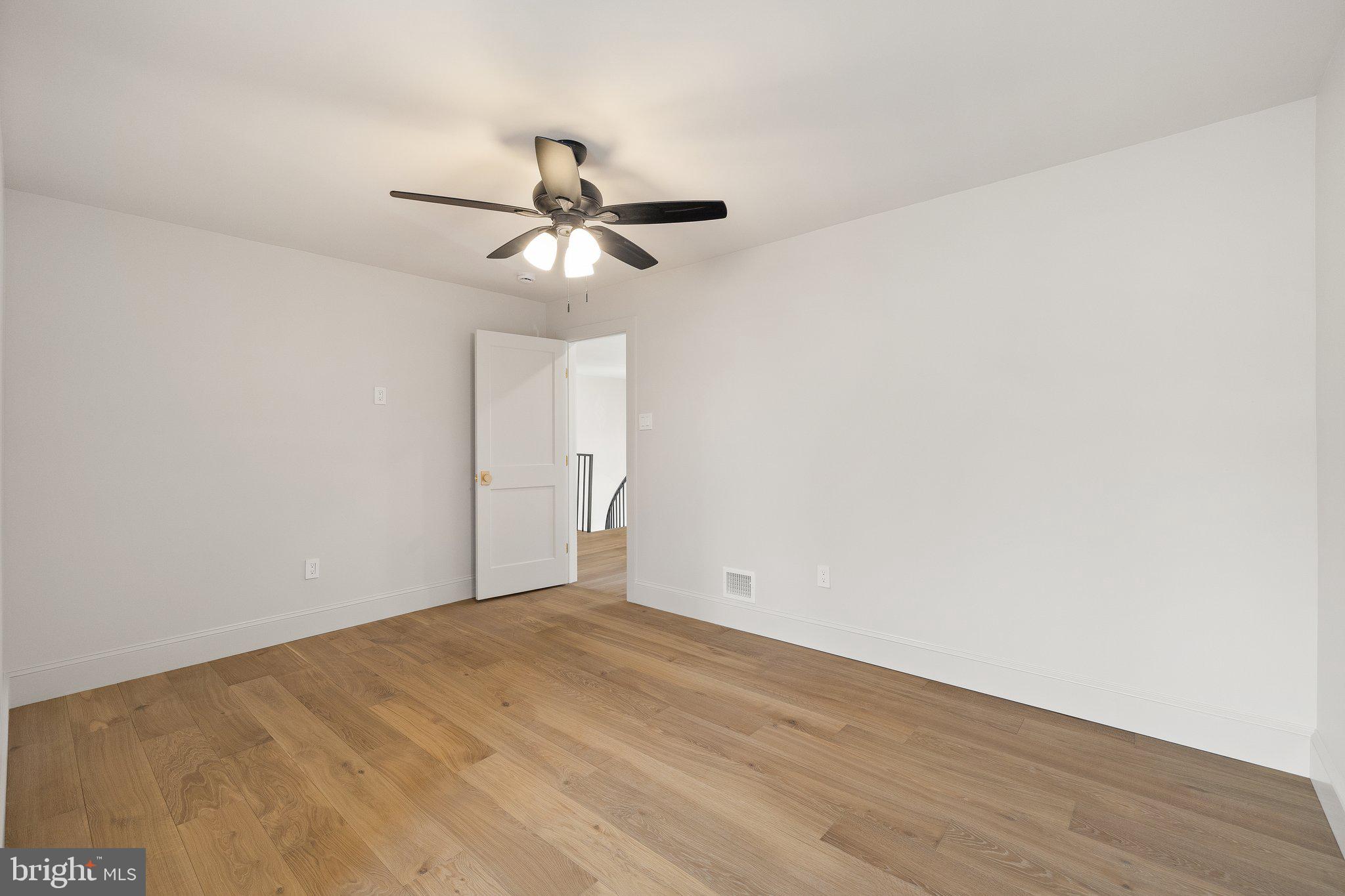 1555 Beechnut Circle Ambler, PA 19002 - Photo 46 of 58 a view of a big room with wooden floor and windows in a room