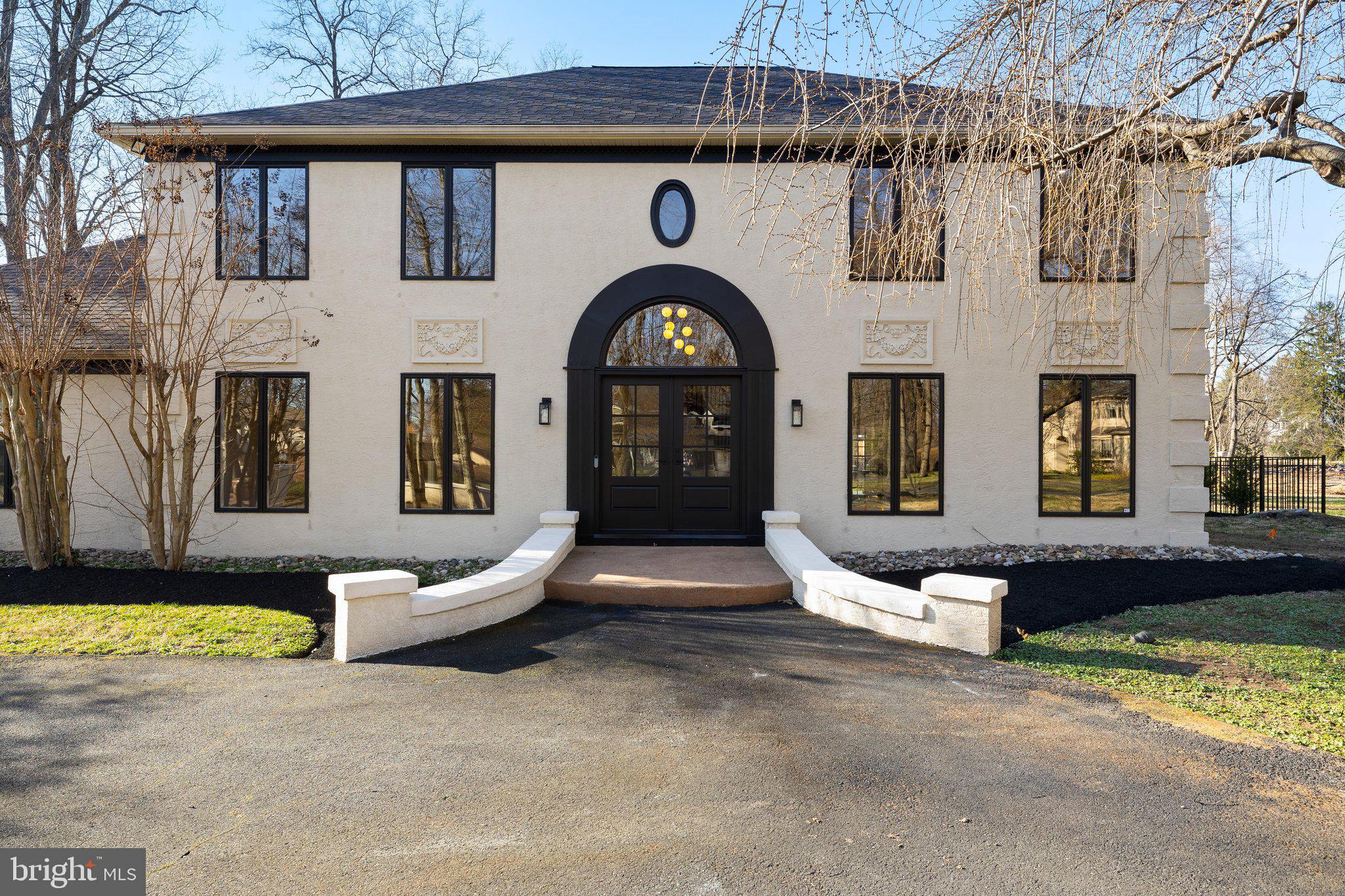 1555 Beechnut Circle Ambler, PA 19002 - Photo 5 of 58 a front view of a house with a yard