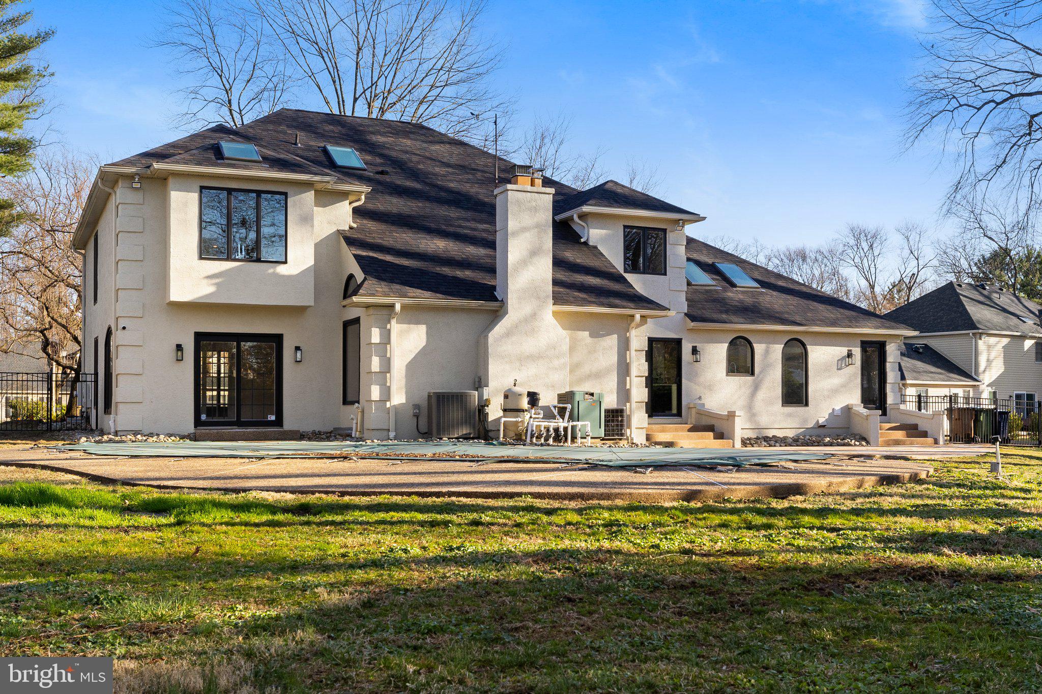 1555 Beechnut Circle Ambler, PA 19002 - Photo 54 of 58 a front view of a house with a swimming pool