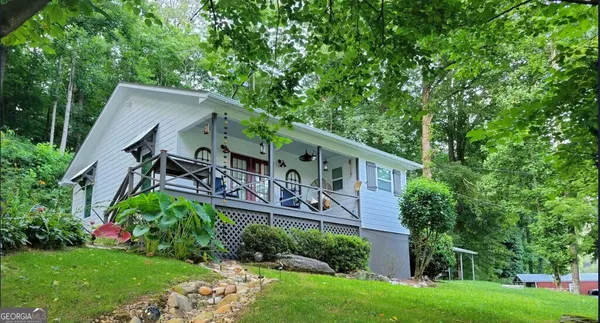 front view of a house with a big yard