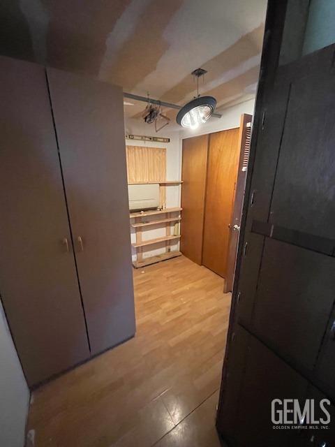 Undisclosed Address Bodfish, CA 93205 - Photo 13 of 19 a view of walk in closet with empty racks