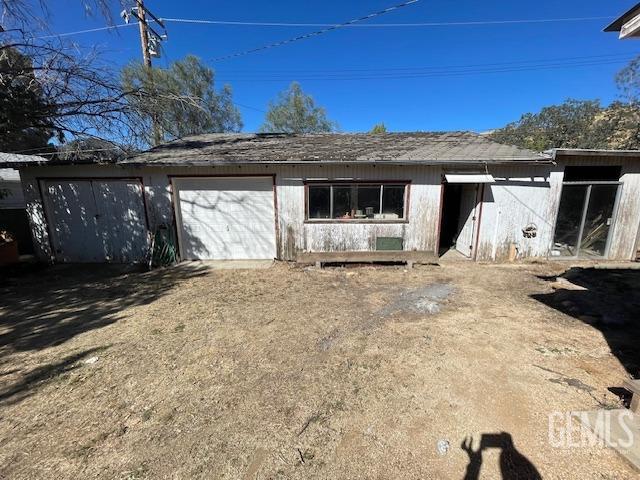 Undisclosed Address Bodfish, CA 93205 - Photo 17 of 19 a front view of a house with a yard